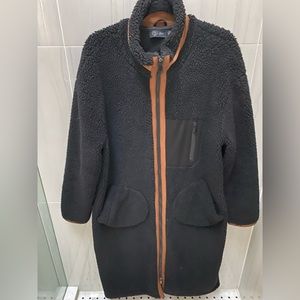 Black long Teddy bear coat with zip and brown trim